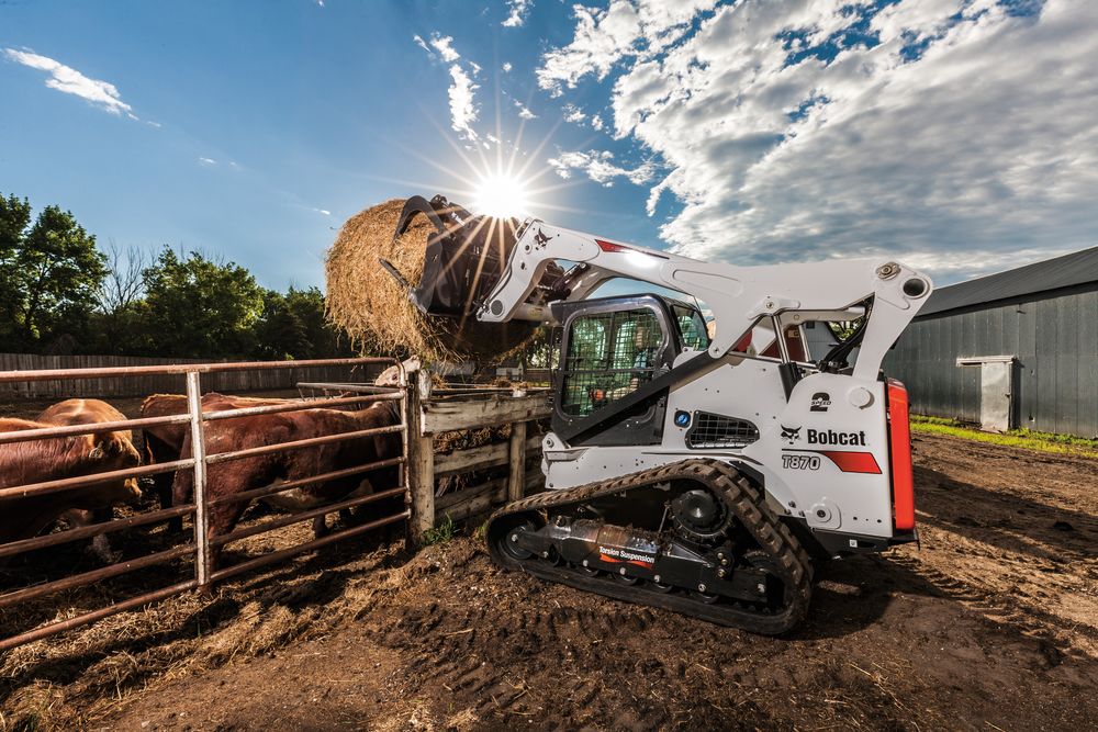 Мини погрузчик Bobcat s650 снег